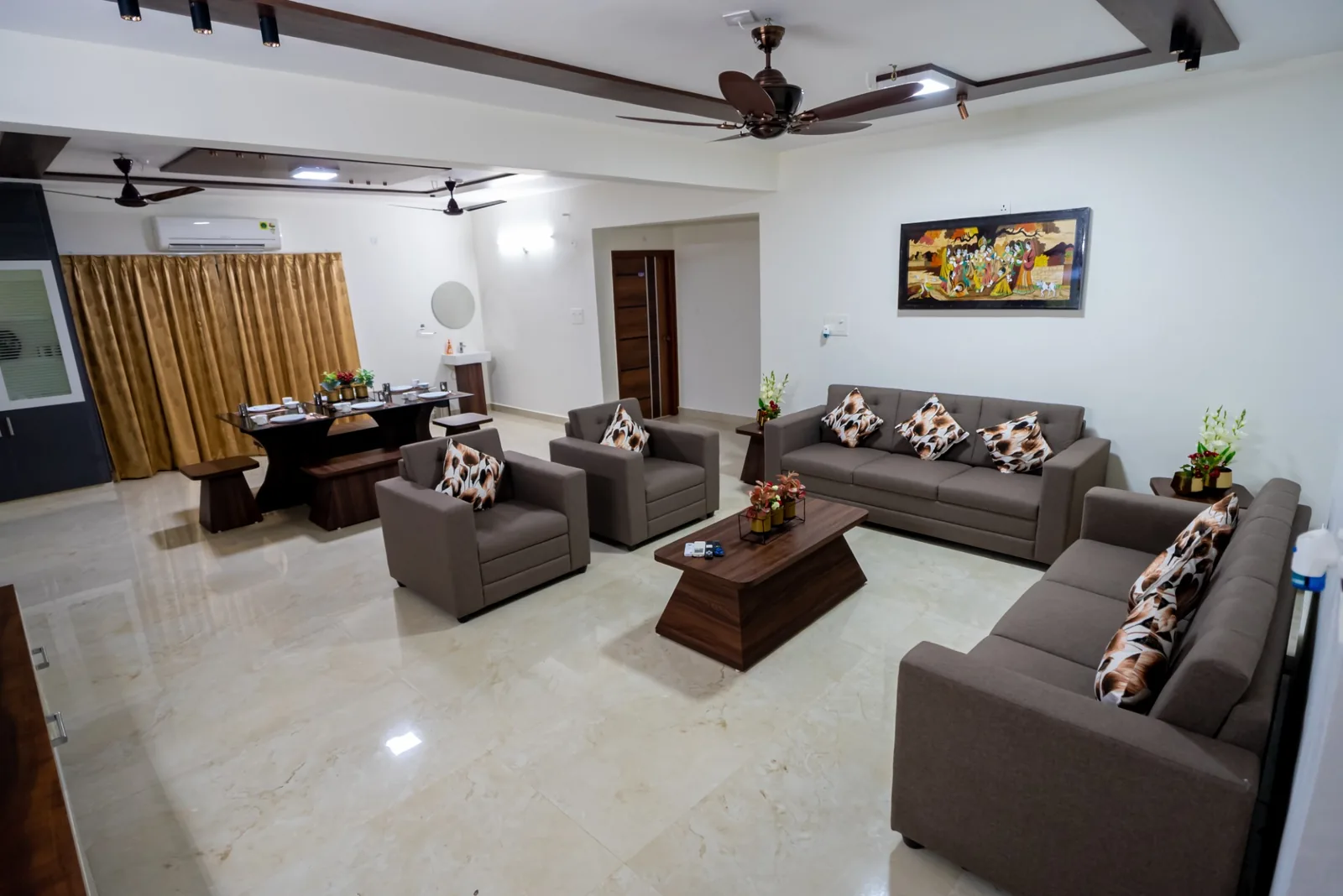 Spacious air-conditioned living room at Mahas Vrindavan 3BHK family apartment in Tirupati